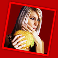 Sexy girl eating a hamburger